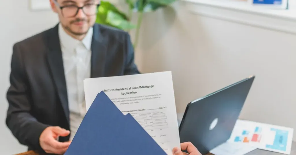 Loan officer discussing a business loan application with a client