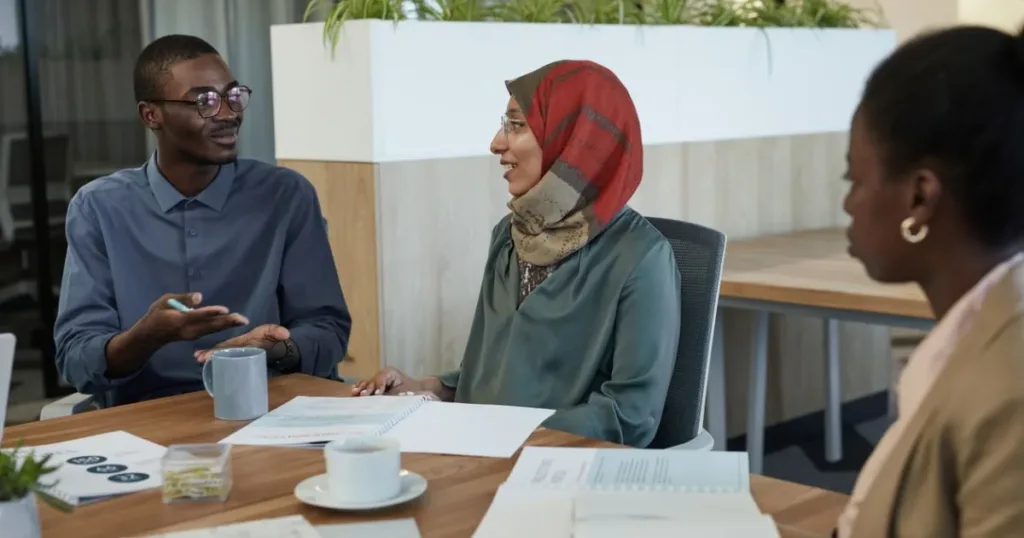 A man and woman comparing documents together, representing a side-by-side comparison of credit bureaus.