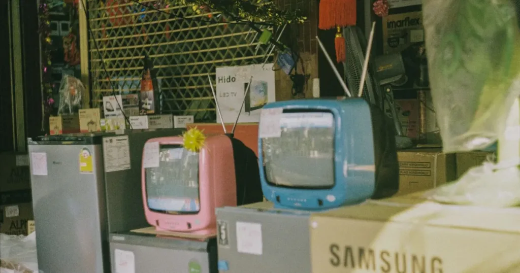 Customer browsing appliances inside an electronics store