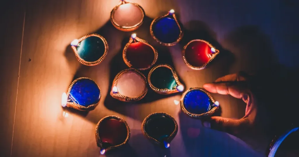 Rows of diyas and oil lamps lit for a Diwali celebration