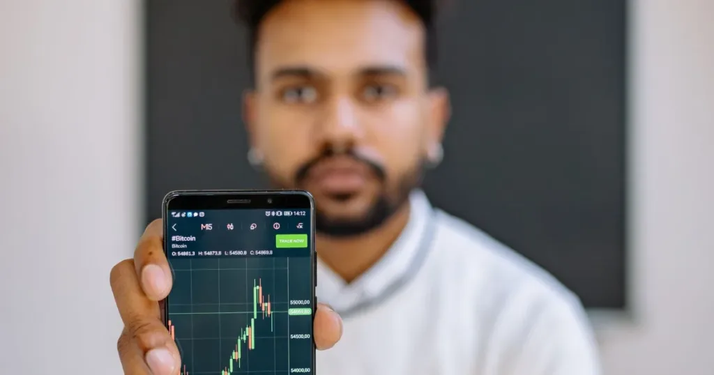 Indian man checking his credit score on a smartphone