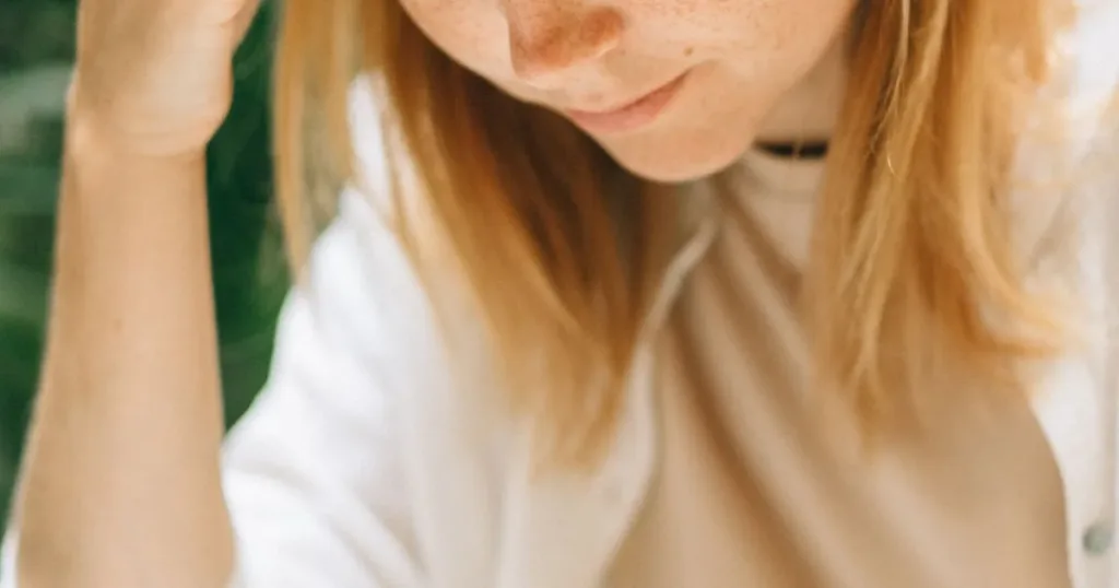 Person checking financial documents for report errors