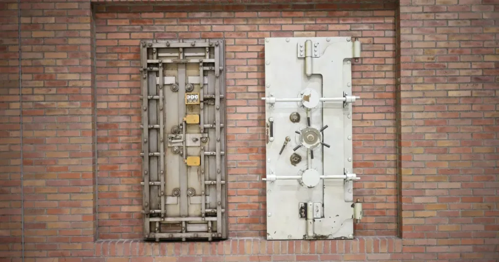 Closed bank vault door symbolizing the fixed deposit that secures an FD-backed credit card