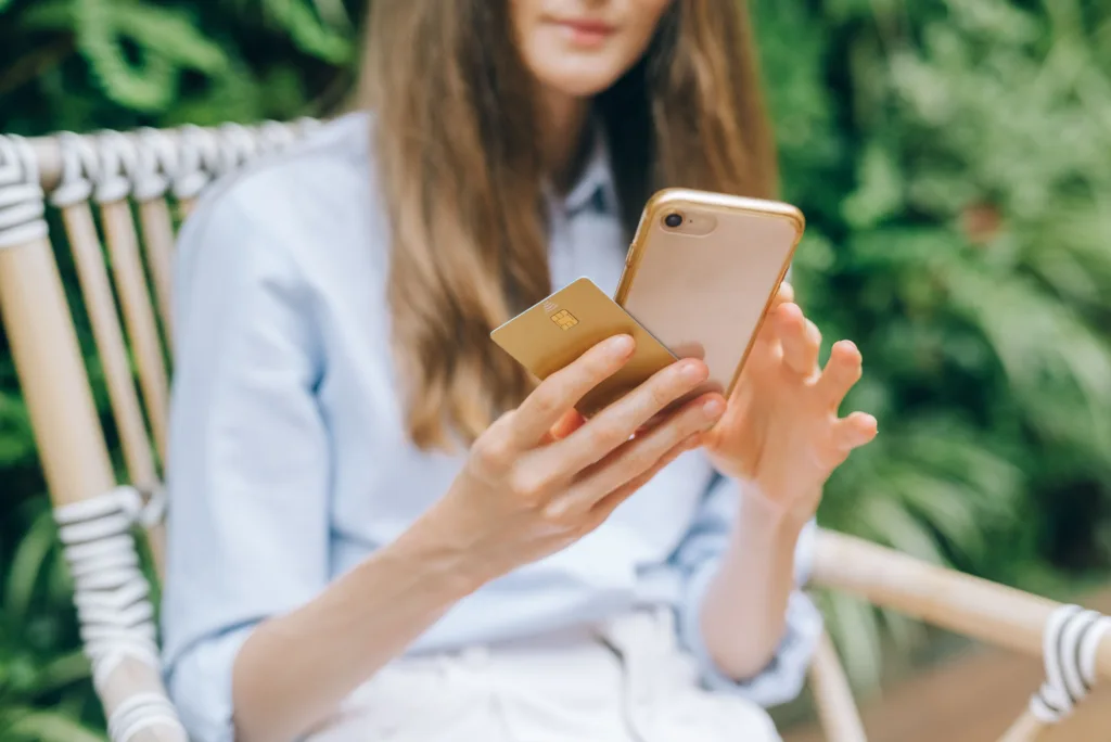 Woman checking her bank account on a smartphone