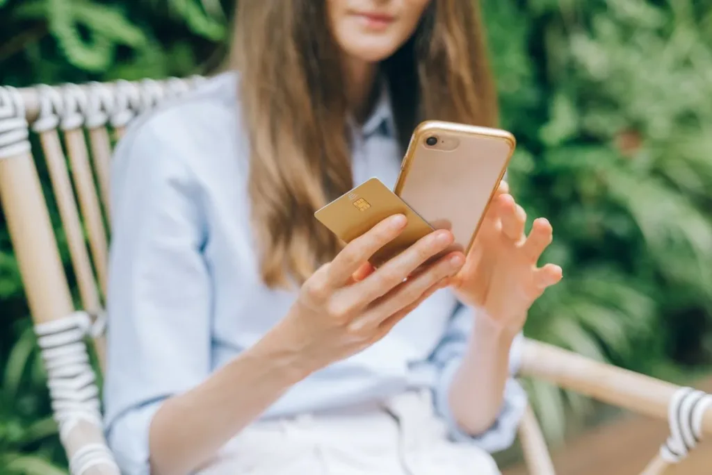 Woman checking a mobile banking app on her phone