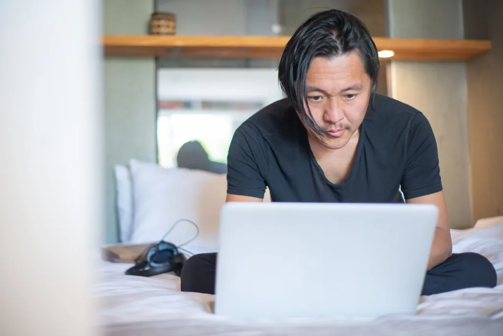 Man working from home on a laptop as a freelancer