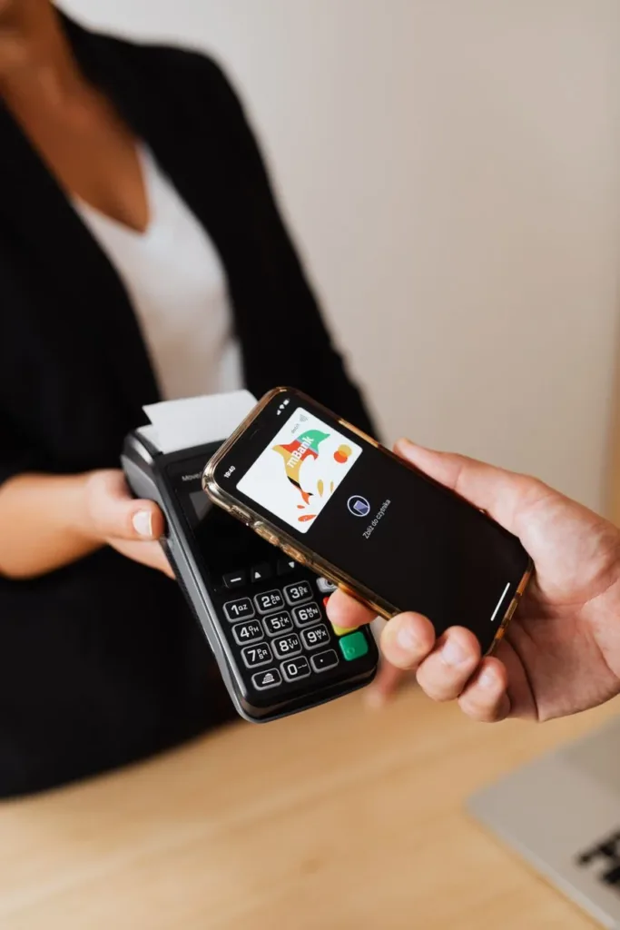 Small business owner accepting a GCash payment on a phone