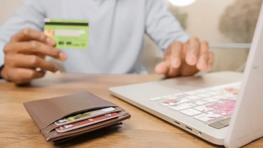 Person comparing bank cards