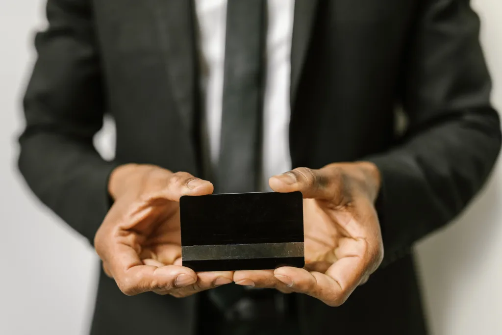 Person holding a debit-style bank card