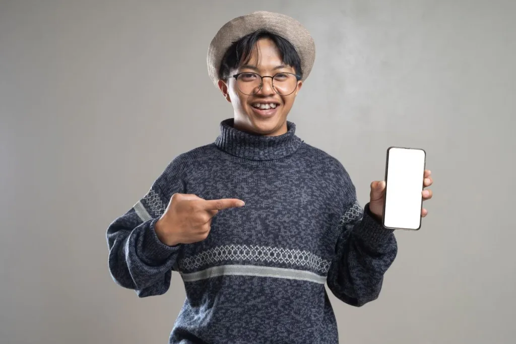Man smiling while checking a banking app