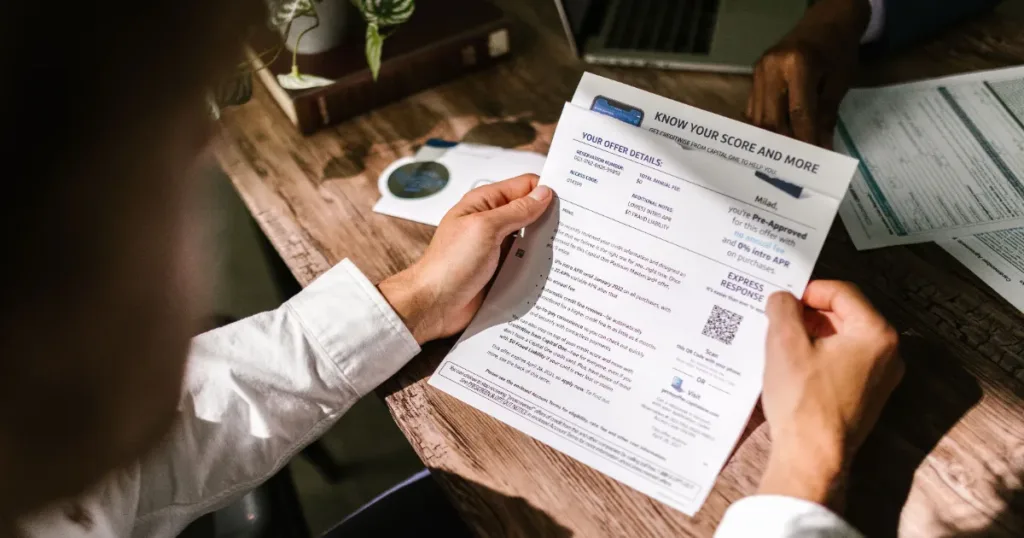 Person reviewing a printed bank statement