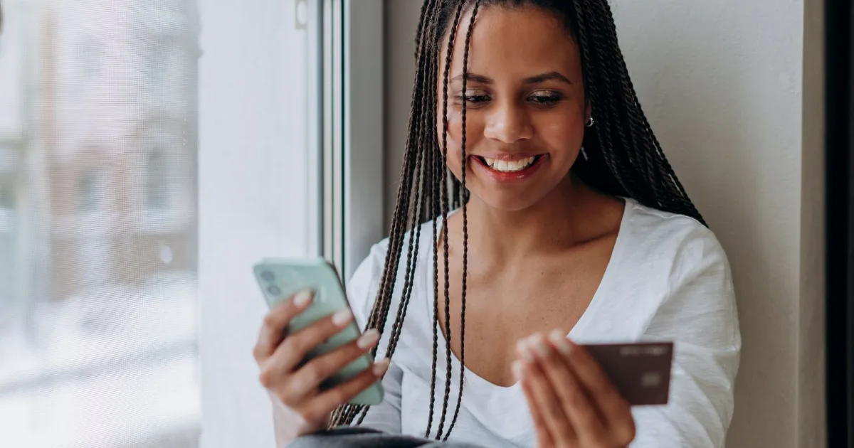 Person comparing banking options on a phone