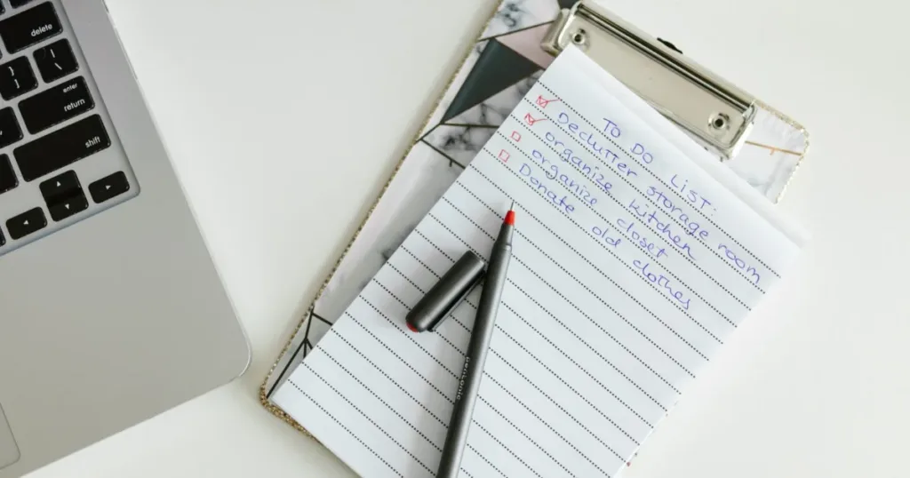 Checklist on a clipboard representing preparation before applying for a credit card