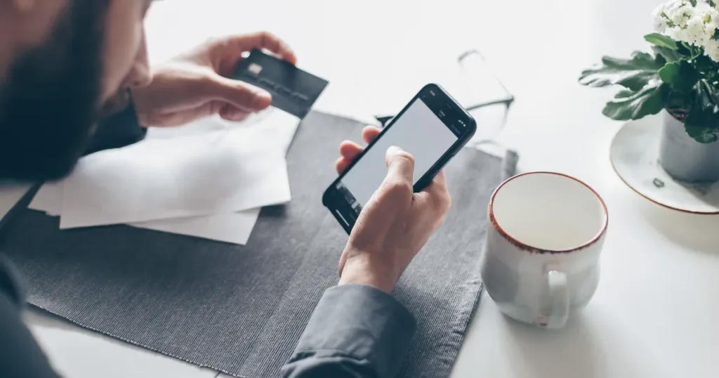 Person checking a banking app on a smartphone