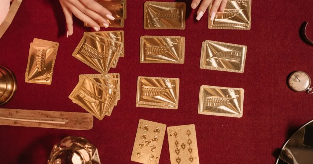 Gold bank card on a table representing a rewards-tier credit card