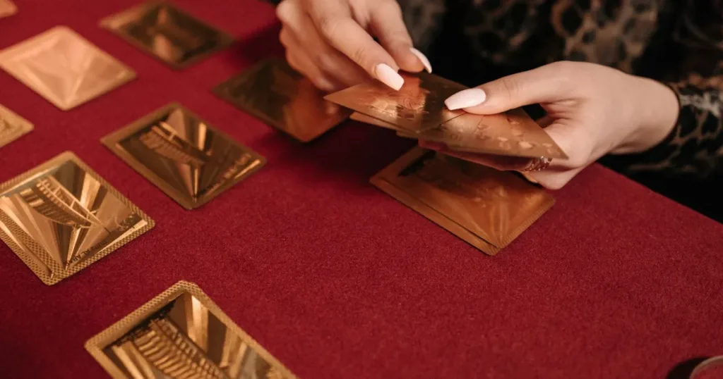 Gold-tier bank card resting on a table representing a beginner tier comparison